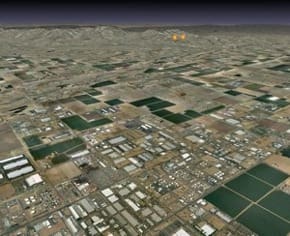 A 3 d image of an industrial area in the middle of a city.